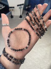 Load and play video in Gallery viewer, Black Tourmaline in Quartz faceted stone bracelet